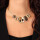 Taratata Art Nouveau Kette - elegant maximalistische Halsekette mit edlen Schmucksteinen, Vergoldeten Ornamenten und samtig dunklen Farben